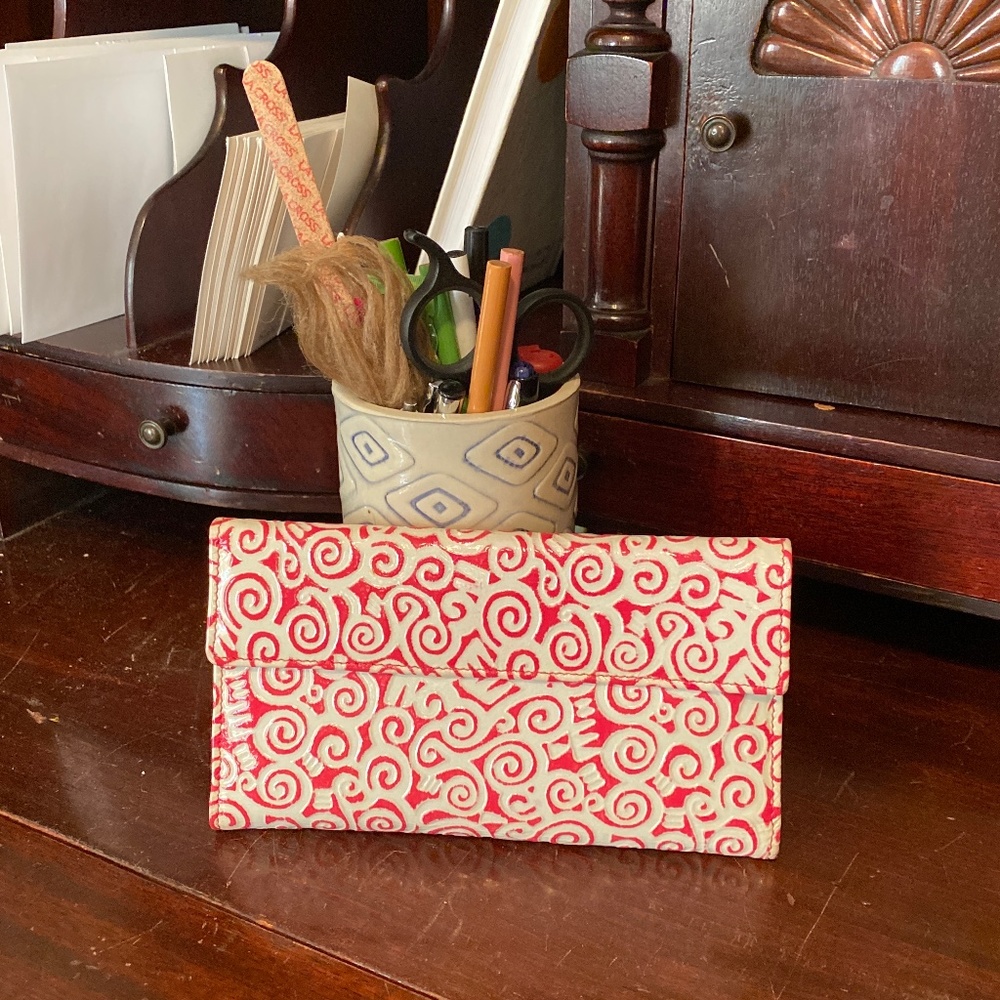 Pink leather  embossed Lodi’s wallet